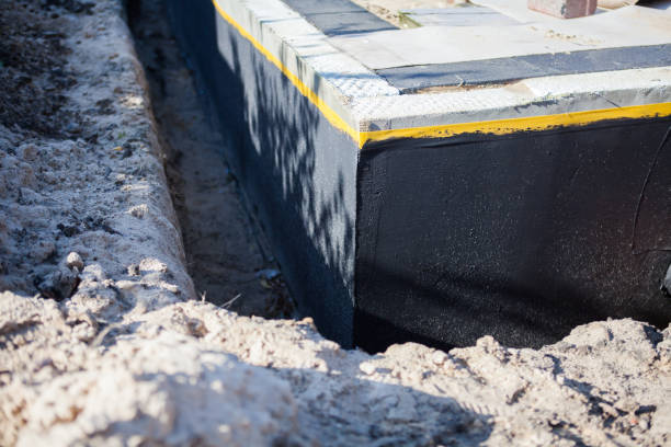 Professional Waterproofing technician working in Hampton, GA